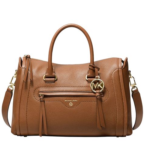 Michael Kors used medium bags